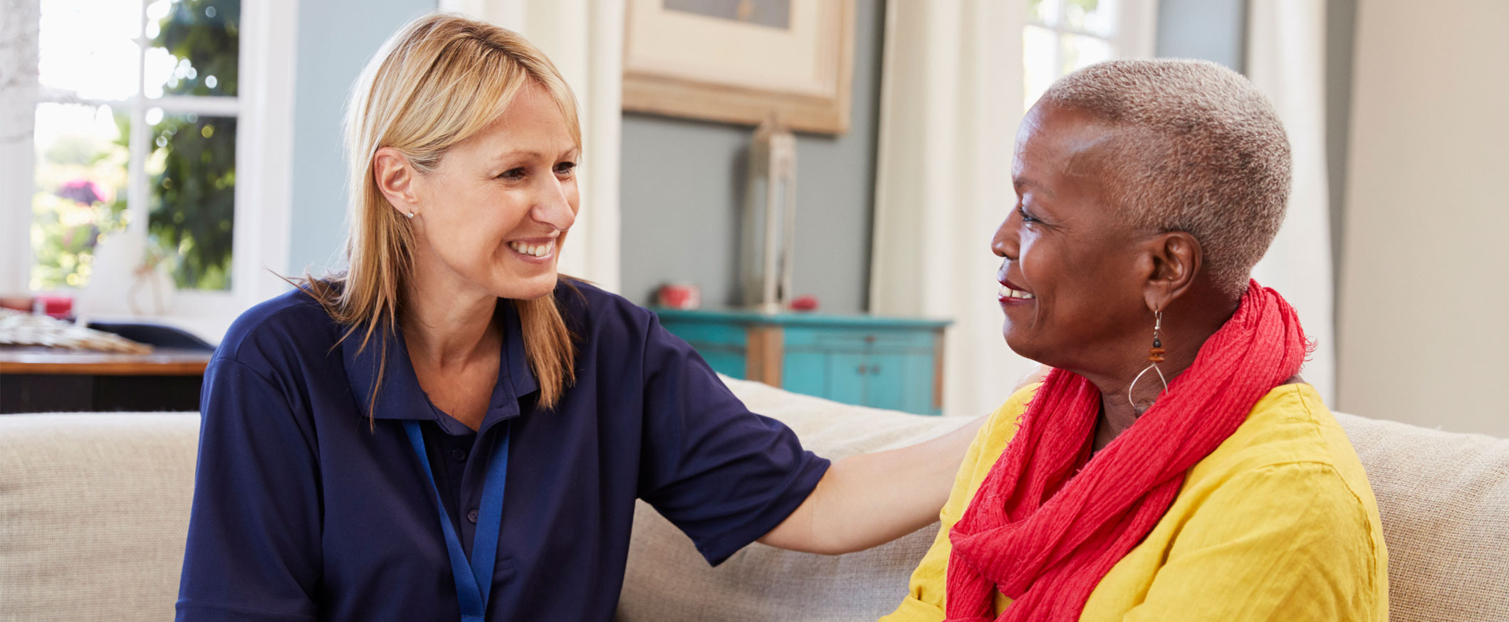 Care worker talking to lady